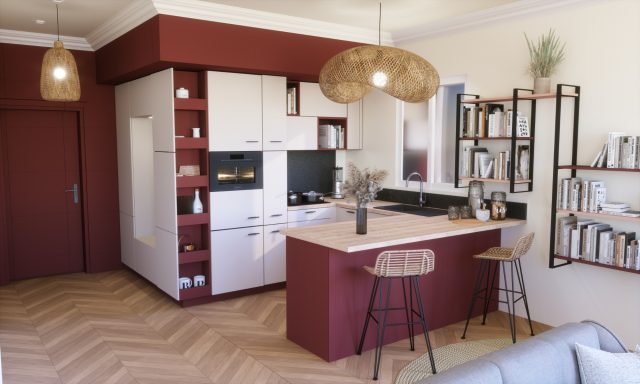 Cuisine moderne avec armoires rouges, îlot central en bois et décoration minimaliste.