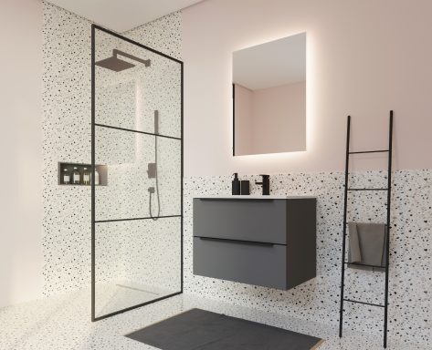 Salle de bain moderne avec douche vitrée, meuble gris et miroir lumineux.